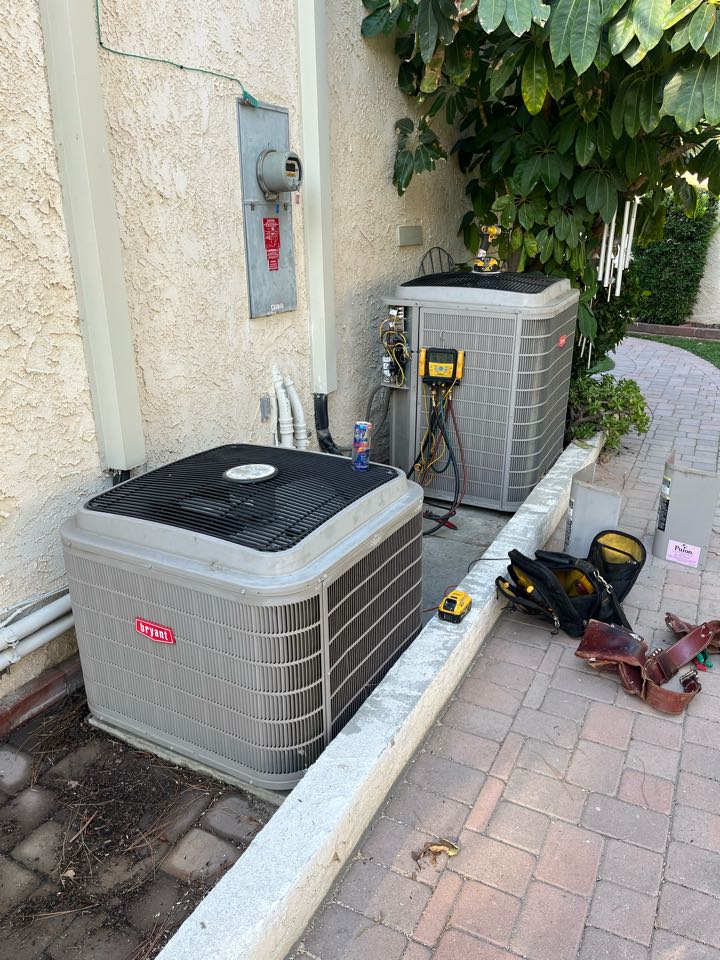Changing out these two split systems here in Granada hills 
