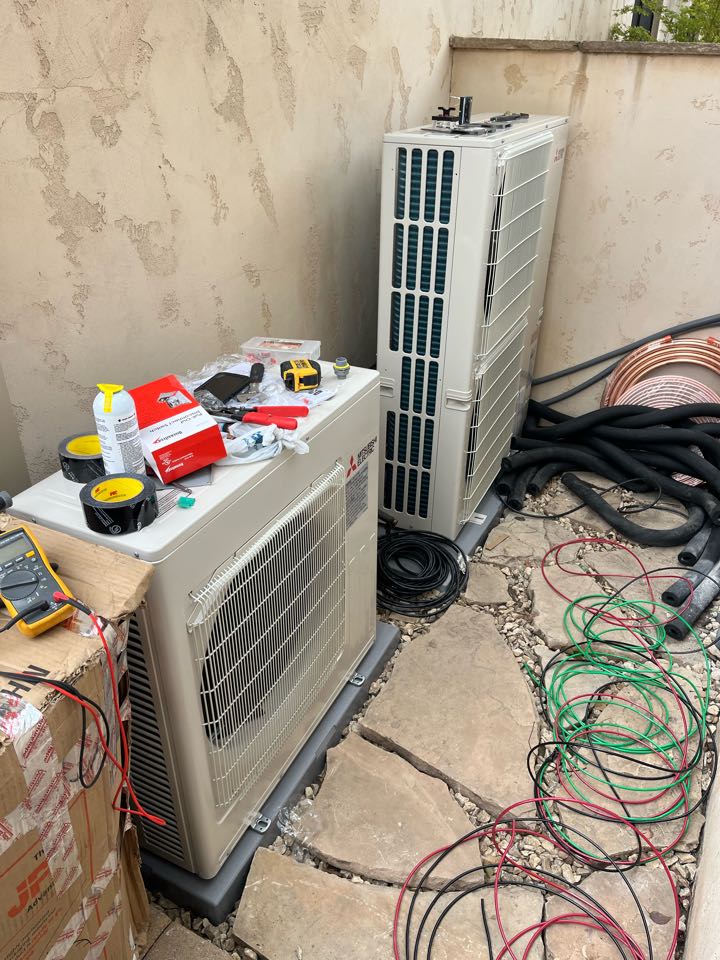 Installing two Mitsubishi split systems here in Burbank 