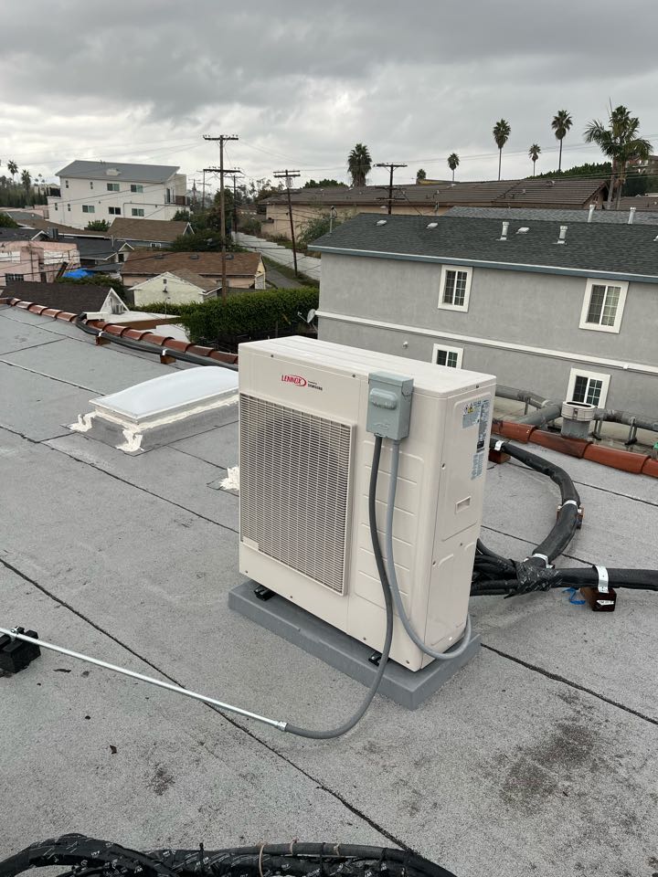Finishing a Lennox ductless system here in LA 