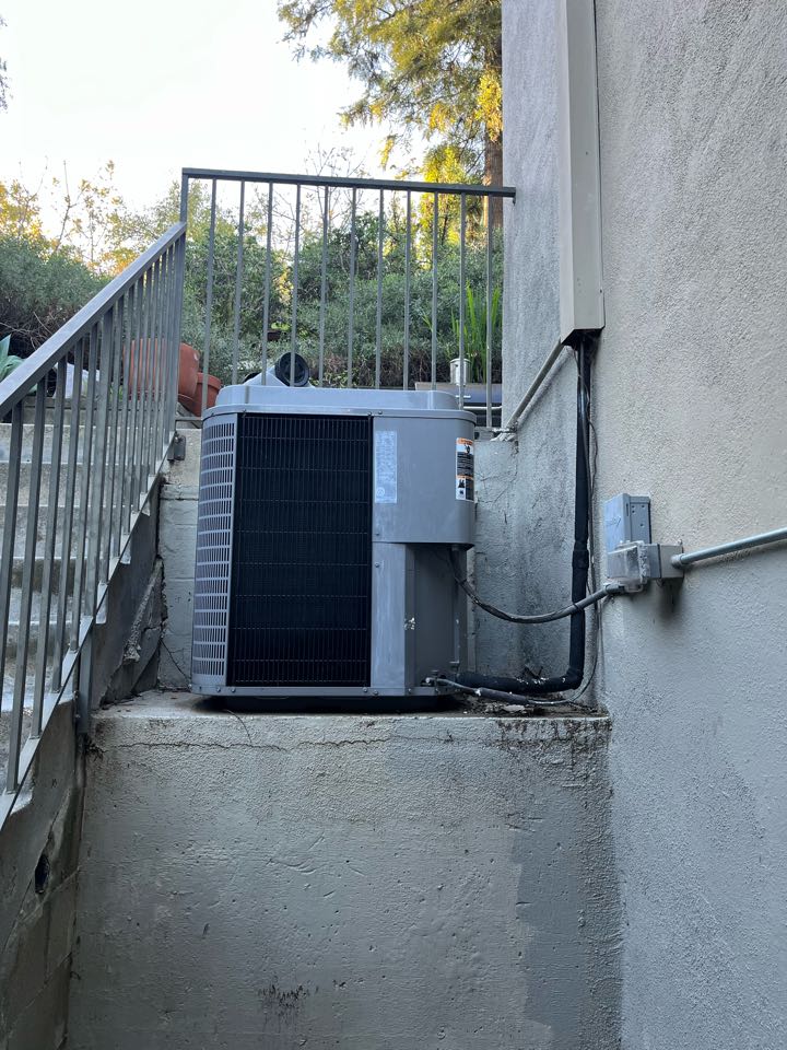 Removing this gas split system and installing a Mitsubishi heat pump and cutting in a new return here in LA