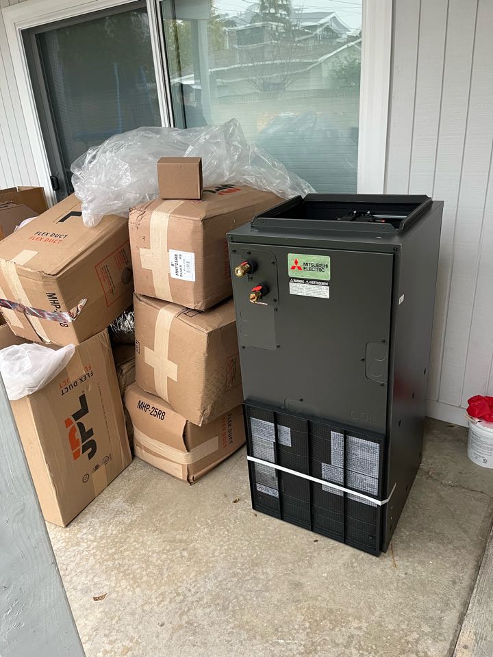 Installing a Mitsubishi 3 zone system in a house here in Long Beach 