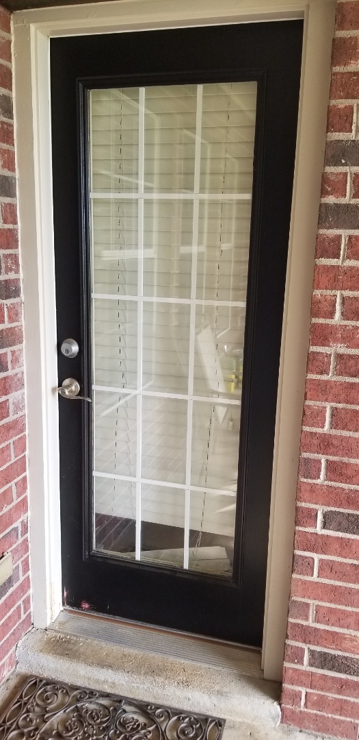 Broken Arrow, OK - Measuring an exterior door at the Mack residence Broken Arrow, OK - Measuring an exterior door at the Mack residence