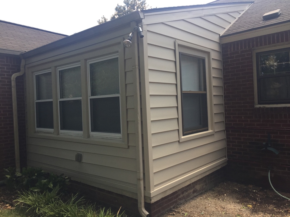 Tulsa, OK - Craneboard solid core siding on back addition. Country beige color Tulsa, OK - Craneboard solid core siding on back addition. Country beige color