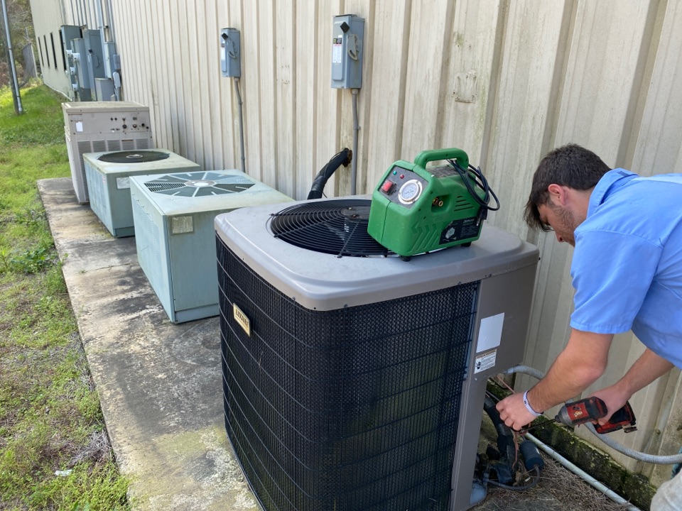 Performing  Preventative Maintenance on a TRANE unit in Covington Louisiana. 