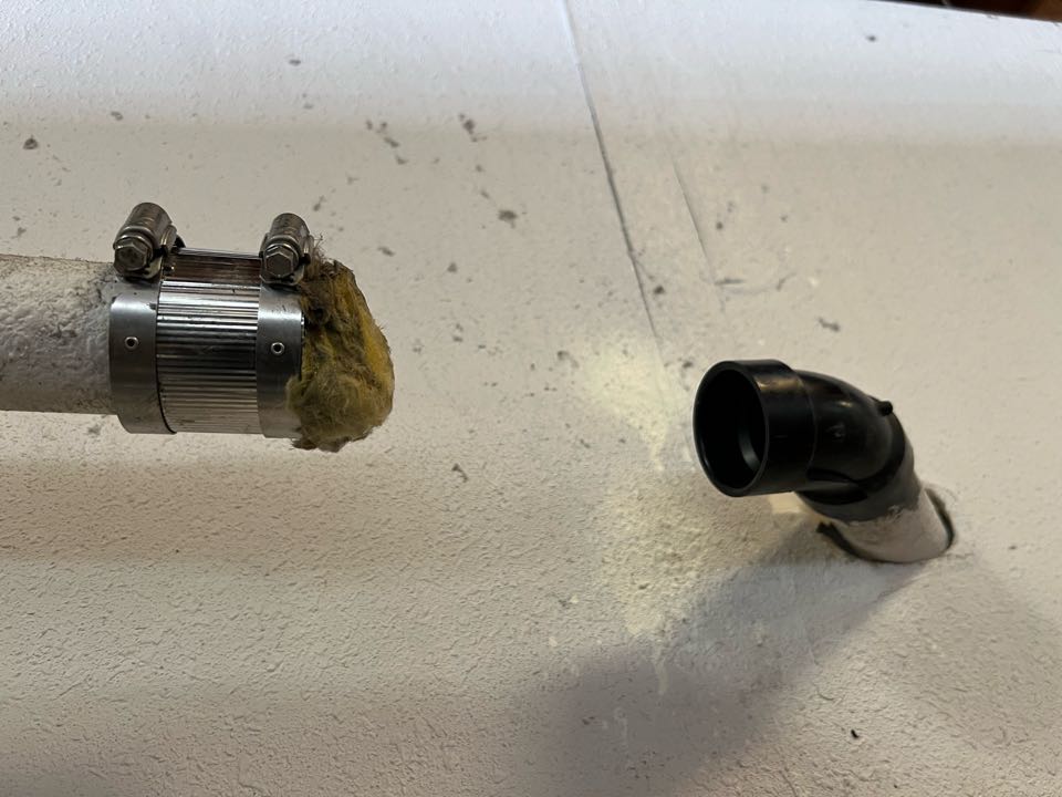 Plumber Needed. ABS leaking at the 45.