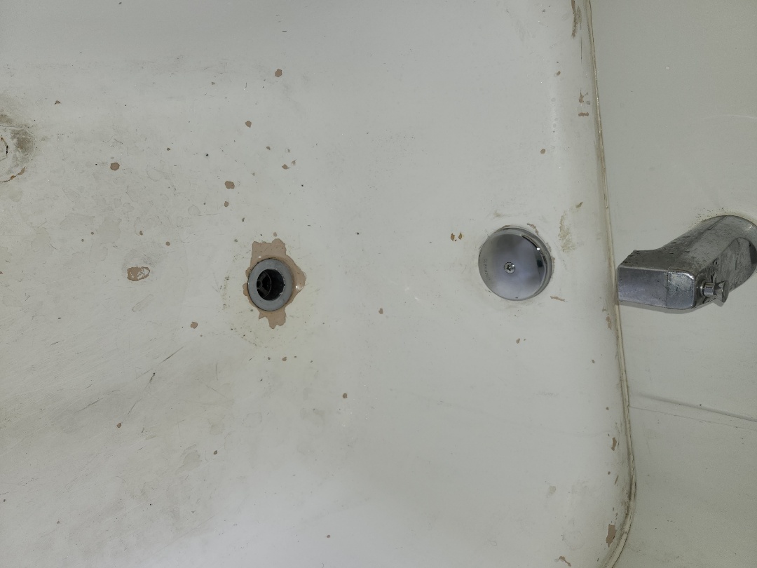 Clogged Back 2 back shower tubs 
