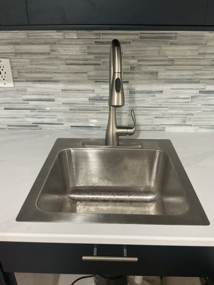 Installed new customer supplied kitchen faucet and sink in Farmington Hills