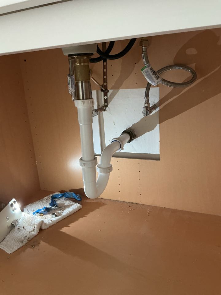 Installed new lav pop up and drain p-trap under bathroom sink in Grosse Pointe Woods