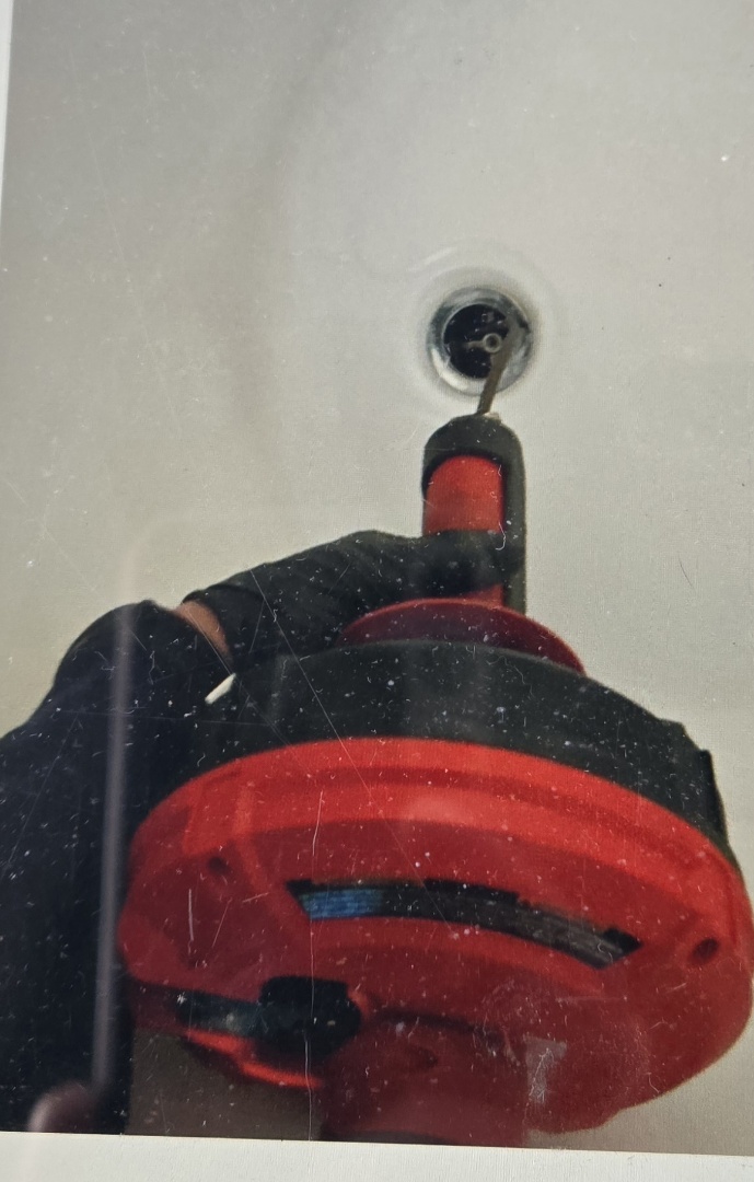 cabled through the tub drain in the main floor bathroom. Warren 