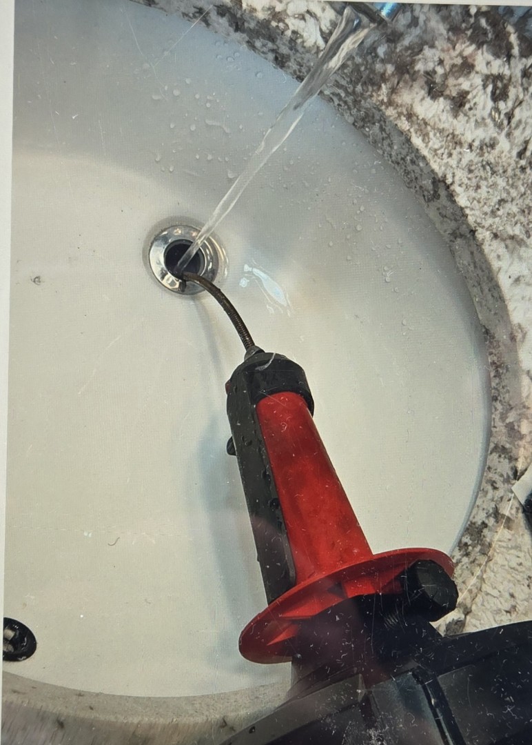 cabled through the lav sink drain in the main floor bathroom. eastpointe 