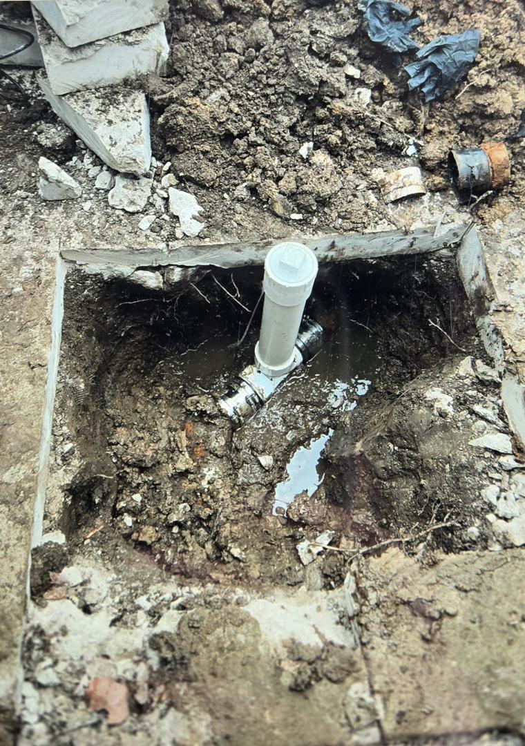 performed a hand dig outside for repair to the sewer line. Southfield 