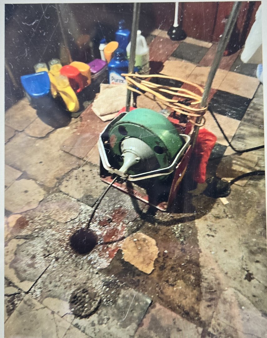 cabled through the floor drain in basement laundry area. Grosse point 