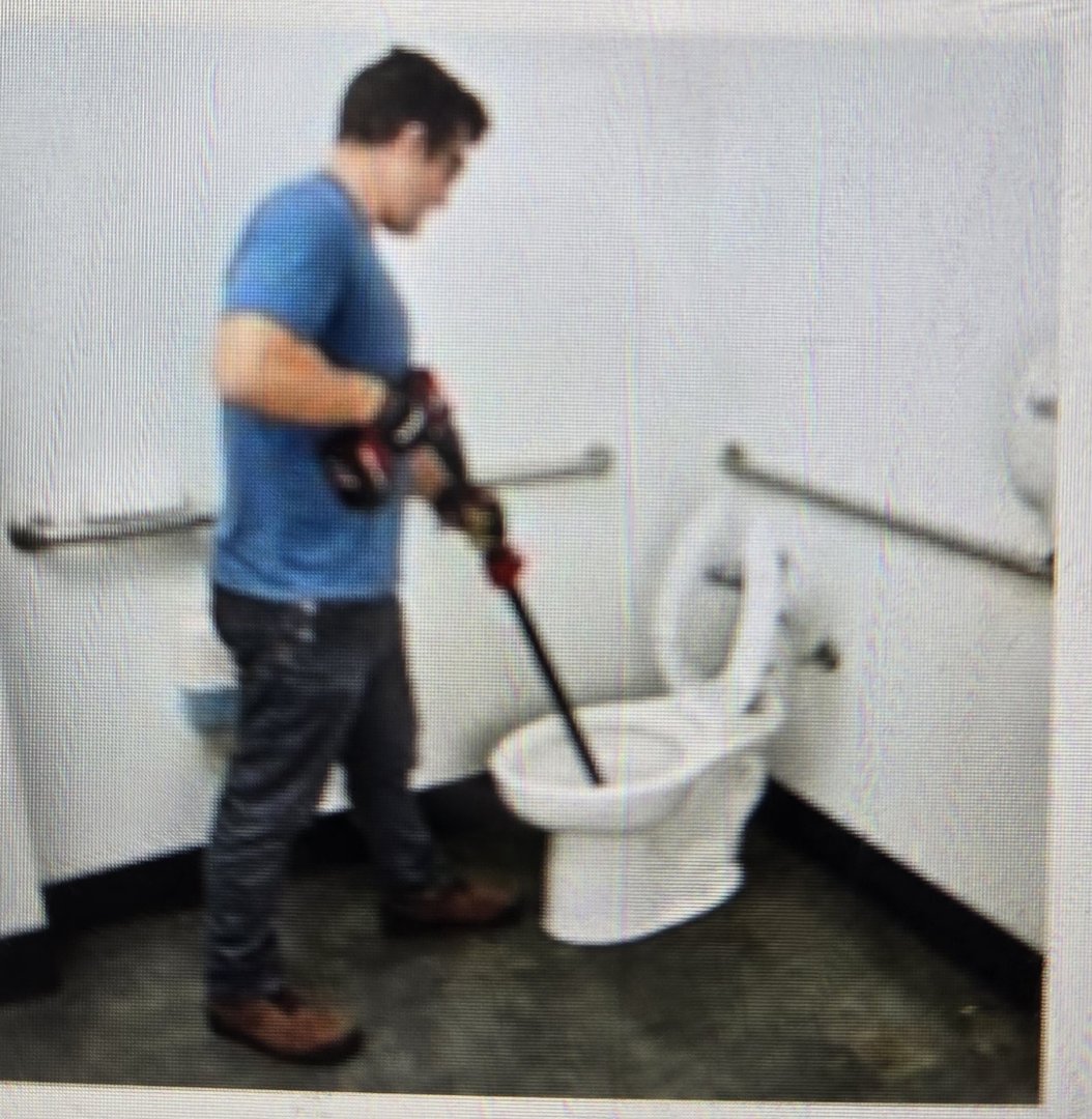 augered toilet in main floor bathroom. Roseville 