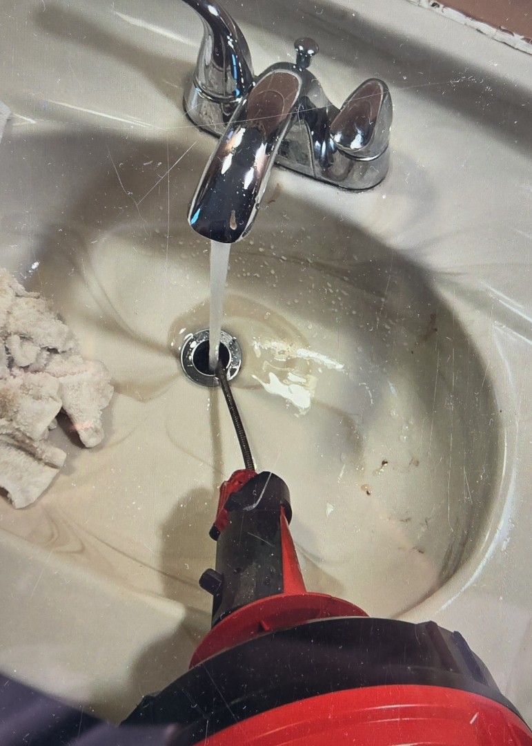 cabled through the kitchen and lav sink drain lines. West Bloomfield 