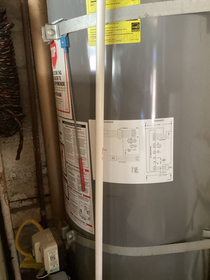 Water heater in stone garage area in La Verne, California for a single-family three bathroom house