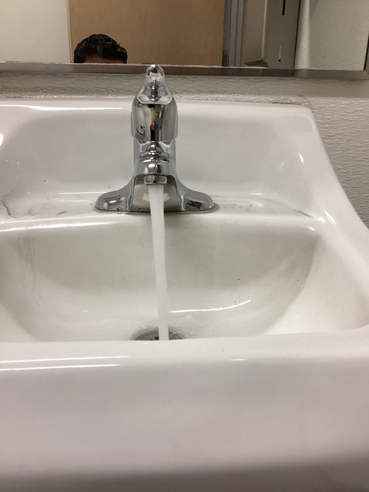Faucet installed in men’s restroom and angle stop valve in Anaheim ca for a commercial building 
