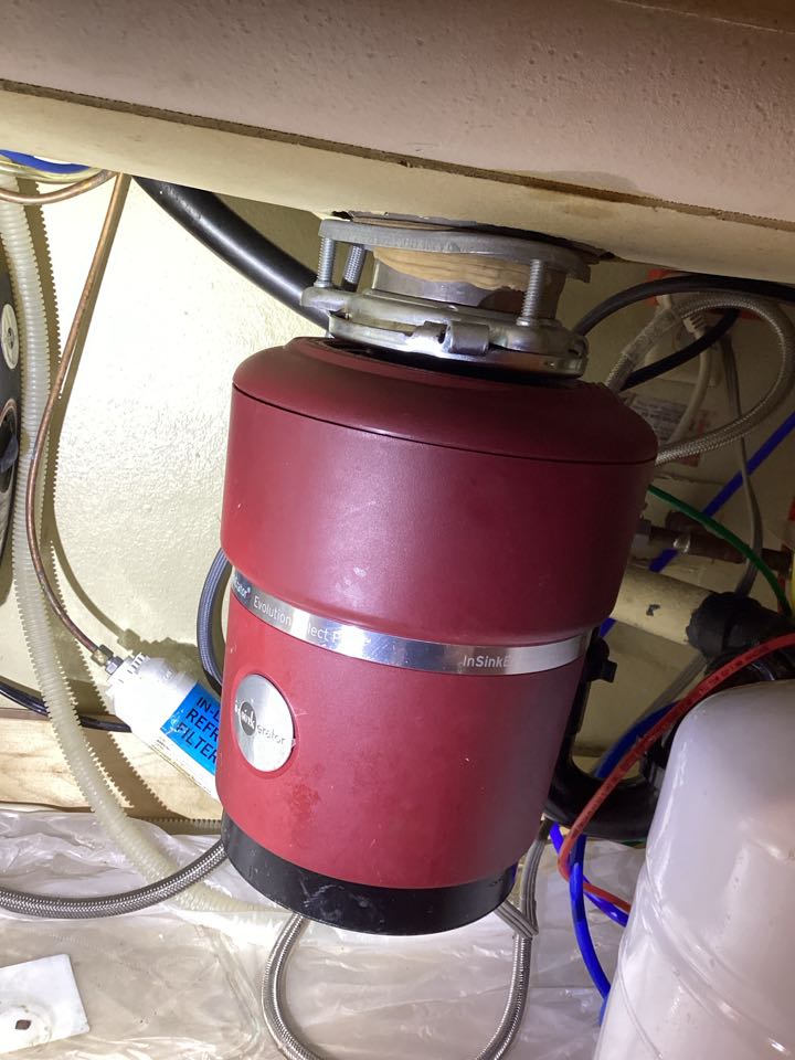 Install customer supply garbage disposal in Laguna Woods, California for a single-family two bathroom house