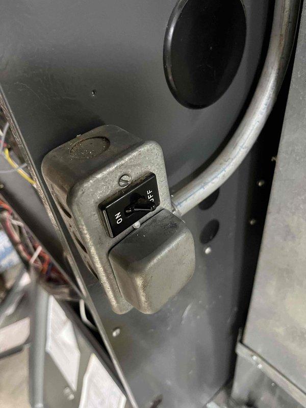 Diagnosed 10-year-old LP Goodman GMEC96 furnace displaying intermittent flame outages with reset button repeatedly tripping on gas valve model 36J54-238. Determined heat exchanger was plugged and flame sensor had failed, contributing to unsafe operation conditions. Performed warranty replacement of complete furnace unit after identifying multiple critical system failures that prevented reliable heating operation.