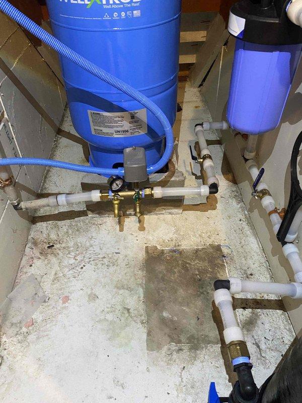Installed Pioneer filtration system designed for Lead (99.62% reduction), PFOA/PFOS (97.9% reduction), and chlorine (>85% reduction) treatment. Complete installation included necessary piping connections to existing water system with sediment filter and additional filter. System was properly connected with PVC pipes and valves, with electrical routed through wall into laundry closet for power supply. Installation was completed successfully with all components functioning as intended.