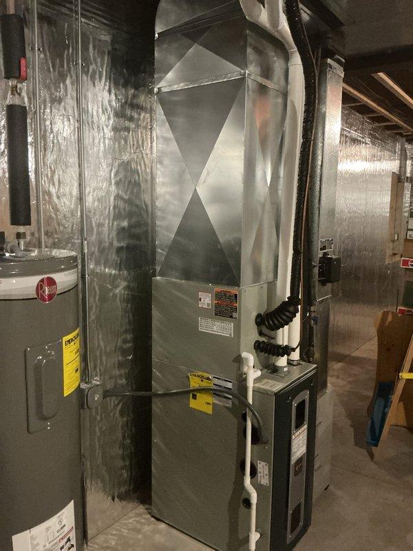 Provided estimate for installation of a Honeywell DR-90 dehumidifier in basement mechanical area where current HVAC system includes X2B080U PSG furnace unit with ductwork and water heater. Proposal includes proper venting and electrical connections for the dehumidifier system to address indoor air quality concerns.