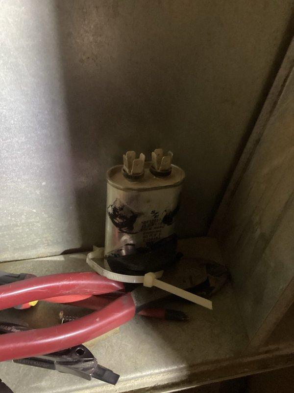 Responded to emergency no-heat call for customer with aging furnace system. Diagnosed failed capacitor causing system failure. Removed worn capacitor and installed new JARD 12.5μF 370VAC replacement unit, restoring proper system operation.