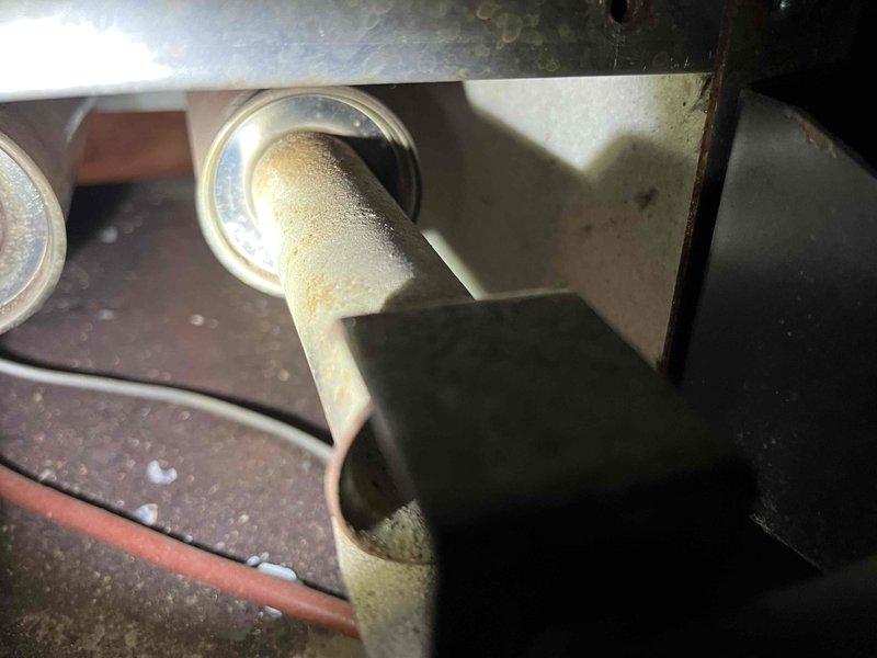 Performed comprehensive inspection of aging boiler system with focus on verifying functionality of multiple thermostats and zone controls as requested by customer. Documented condensation issues around pipe connections and noted potential floor damage near equipment that may require separate repair. Will prepare detailed estimates for recommended repairs/replacements.