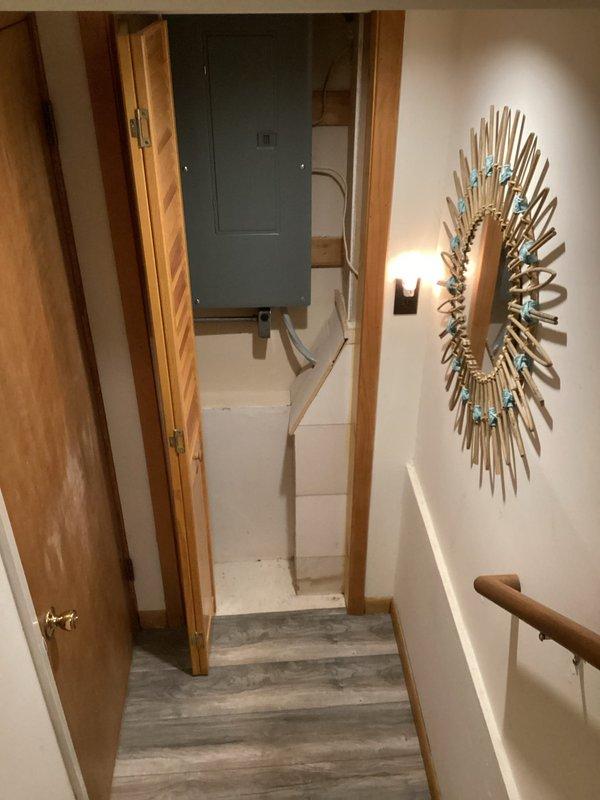 Installed new Square D 100-amp main circuit breaker panel with 30 spaces, including installation of 10 single-pole breakers, 2 AFCI breakers, and 1 double-pole breaker. Completed exterior grounding to code requirements. Panel was successfully mounted and wired in kitchen area with proper conduit routing; additional work beyond initial scope was performed to meet customer requirements.