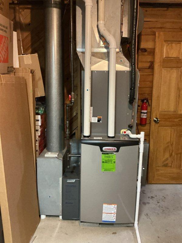 Completed annual preventive maintenance service on Lennox furnace unit. Replaced air filter and humidifier pad according to manufacturer specifications. Inspected blower assembly for proper operation and verified all system components are functioning correctly.