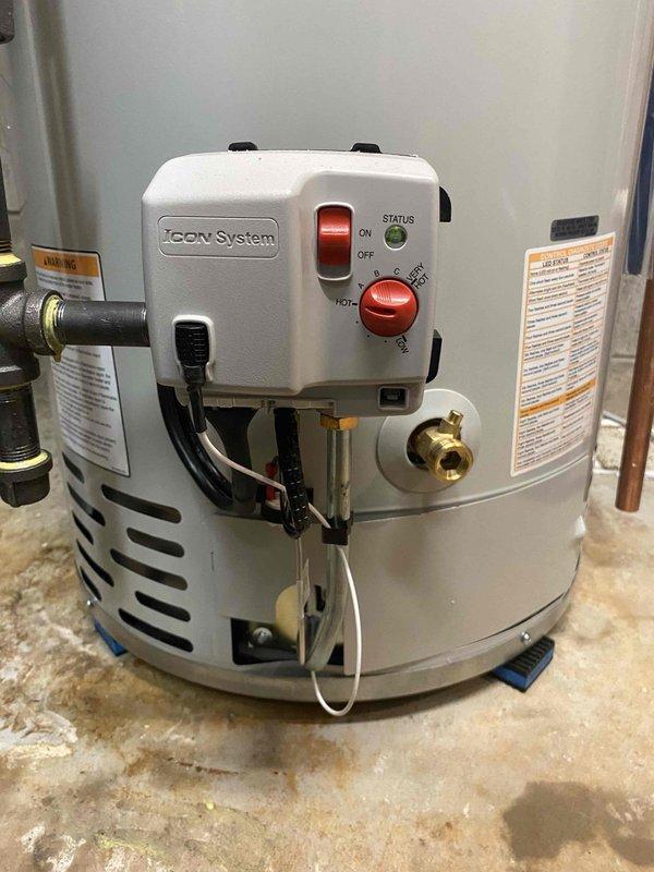 Removed and disposed of leaking 50-gallon water heater that was over 10 years old and no longer serviceable. Installed new Bradford White tanked water heater with ICON System temperature controls. Completed all necessary plumbing connections including copper supply lines, PVC venting, and installed required valves and fittings to ensure proper operation and code compliance.