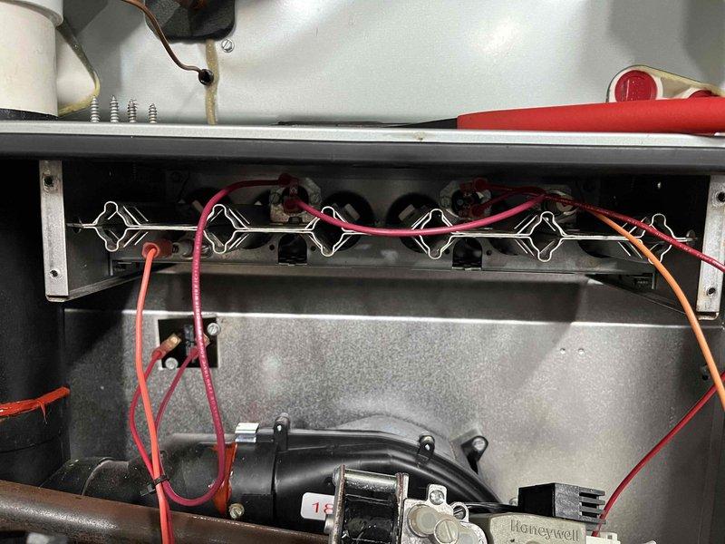 Successfully completed burner replacement service on unit. Removed and replaced deteriorated burner assemblies, ensuring proper connection of electrical components to the Honeywell controller. System returned to normal operating condition with properly functioning heat exchangers.