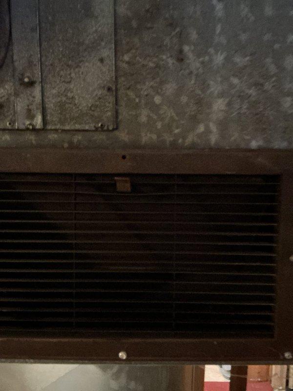 Diagnosed no-heat complaint on older furnace system by identifying clogged pressure switch line, which was preventing proper operation. Cleaned obstruction from pressure switch line and restored system functionality. Noted visible signs of aging on vent components and surrounding structure that may require attention in future service visits.