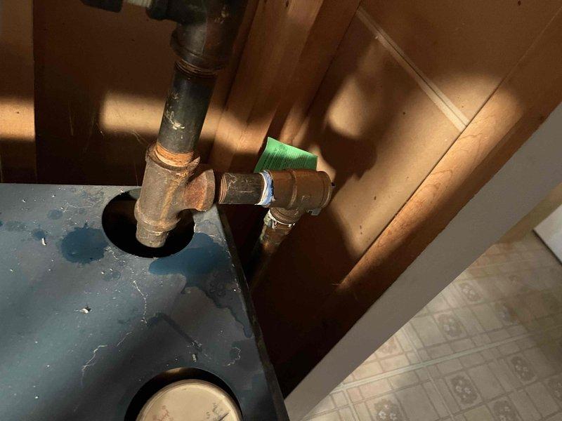 Responded to service call for boiler leakage. Diagnosed waterlogged expansion tank causing relief valve to leak. Offered repair solution to replace both the expansion tank and relief valve to resolve the issue.