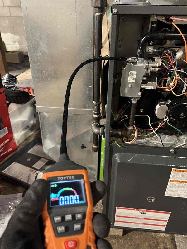 Successfully completed replacement of a faulty 24V LP gas valve (P/N: 0151M00027FK) and pressure switch (P/N: 0130F00646S) on a Goodman furnace system. Conducted comprehensive diagnostic testing with digital meter to verify proper electrical readings after installation. System now operating within manufacturer specifications.