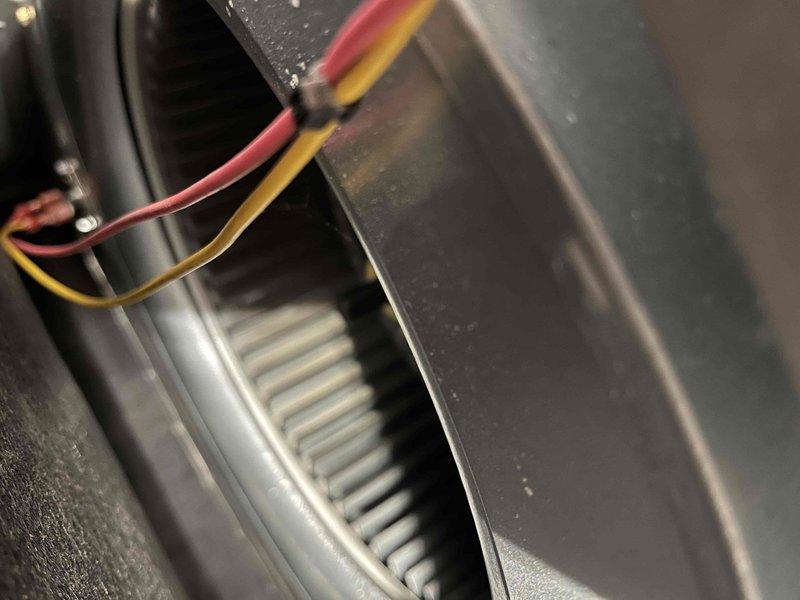 Performed annual preventive maintenance on 3-year-old furnace. Inspected and cleaned blower wheel assembly which showed minor dust accumulation. Examined cooling coils and checked electrical connections, confirming proper wire placement of red and yellow leads. All components functioning normally, no issues identified.