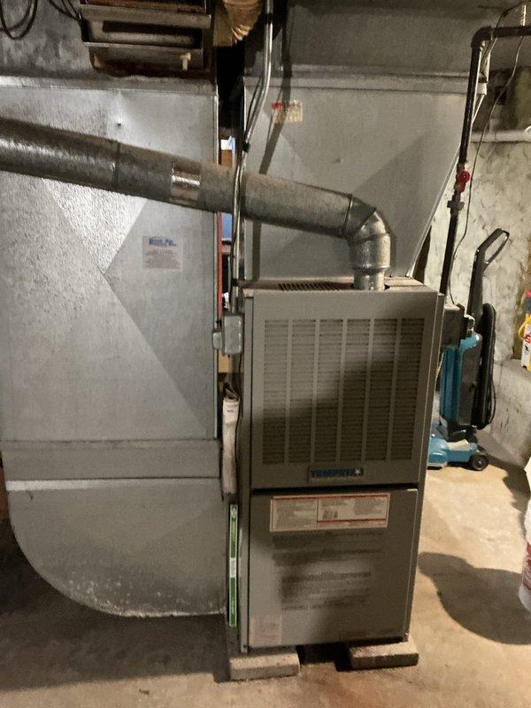 Responded to no-heat call at residence with indoor temperature of 42°F. Upon inspection of the 10+ year old furnace, diagnosed and removed bird obstruction from inducer motor assembly. System was restored to proper operation, and maintenance options were presented to homeowner.