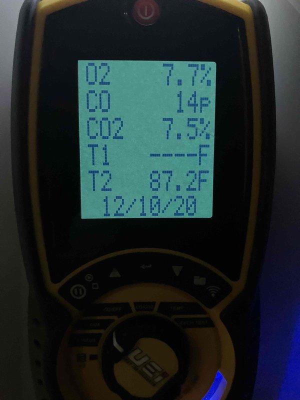 Performed annual preventive maintenance on existing furnace that had been previously rescheduled. System inspection showed furnace operating correctly. Cleaned blower wheel assembly and conducted combustion analysis with readings showing proper operation (O2: 7.7%, CO: 14ppm, CO2: 7.5%, stack temperature: 87.2°F).
