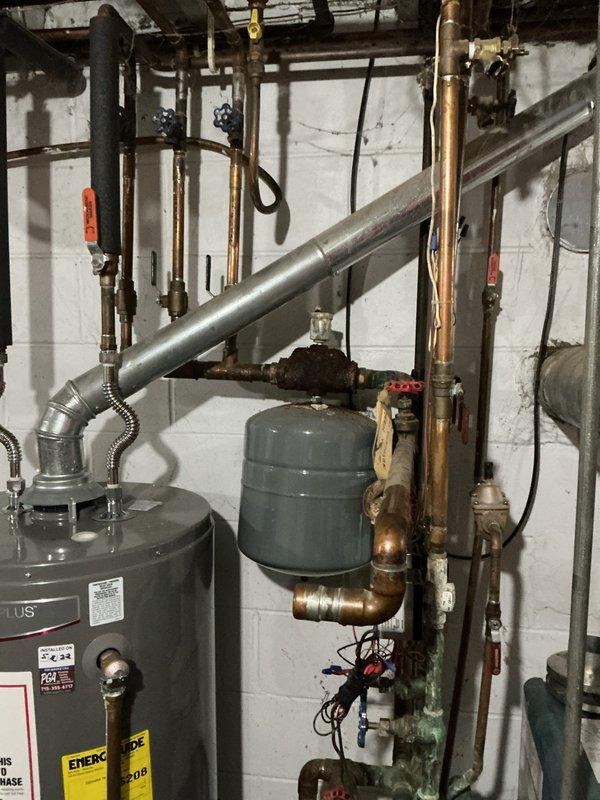 Performed diagnostic assessment on aging hydronic heating system for reported no-heat condition. Identified failed capacitor on circulation pump as primary cause of system failure. Replaced defective capacitor, verified proper voltage to components, and confirmed normal operation of hot water circulation through system. System now producing adequate heat throughout residence.