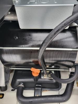 Responded to customer callback regarding suspected oil leak on generator. Identified oil present in three separate locations including the collection pan. After visual inspection and documentation, escalated the issue to specialist technician Zach for further diagnosis and resolution as specialized Generac technical support is required.