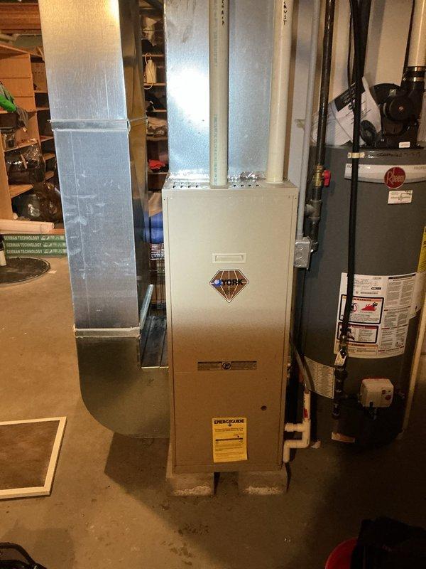 Responded to no heat call for LP furnace in a 25+ year old residential system. Diagnostic testing revealed failed igniter preventing burner ignition despite fan operation. Replaced igniter component, restored proper ignition sequence and verified normal heating operation with ambient temperature at 40°F and dropping.