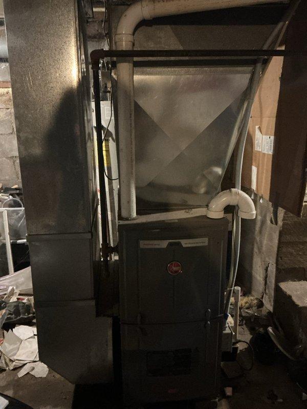 Responded to no-heat service call on a 7-year-old residential furnace. Diagnostic testing revealed a failed pressure switch preventing system operation. Removed defective low pressure switch and installed replacement component. System now functioning properly with normal heating operation resumed.