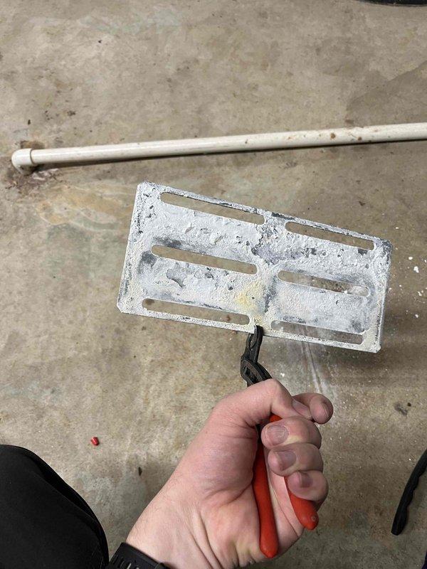 Performed annual inspection on 15-year-old boiler system, identifying significant heat exchanger deterioration and buildup. Located and sealed a hole in the exhaust system, which showed signs of advanced corrosion and structural failure. Customer was presented with repair options to address the aging system components.