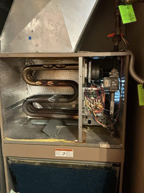 Replaced failed blower motor and installed new OEM-equivalent pressure switch (SPST, -.10" WC, R102463-01) in customer's furnace system. Visual inspection of heat exchanger copper coils showed normal condition. All connections were properly wired and system was tested to verify proper operation after component replacement.