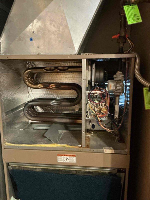 Replaced failed blower motor and installed new OEM-equivalent pressure switch (SPST, -.10" WC, R102463-01) in customer's furnace system. Visual inspection of heat exchanger copper coils showed normal condition. All connections were properly wired and system was tested to verify proper operation after component replacement.