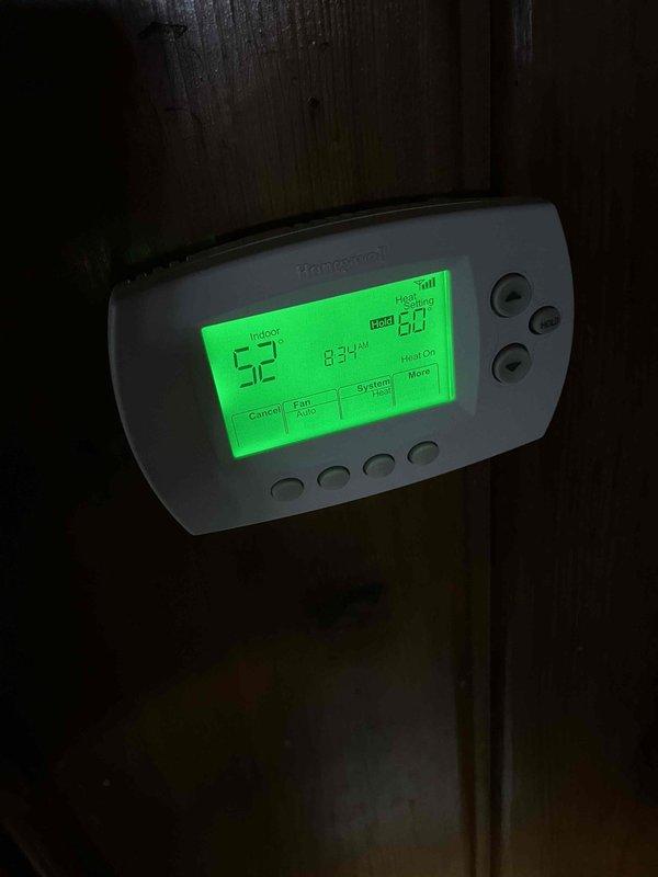 Performed annual prepaid maintenance inspection on customer's boiler system. Verified both thermostats (Honeywell digital and circular dial models) are functioning correctly with heat set to 60°F. No issues identified during the inspection.