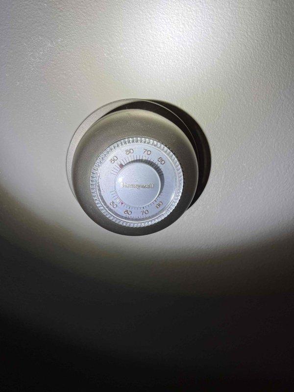 Performed annual prepaid maintenance inspection on customer's boiler system. Verified both thermostats (Honeywell digital and circular dial models) are functioning correctly with heat set to 60°F. No issues identified during the inspection.