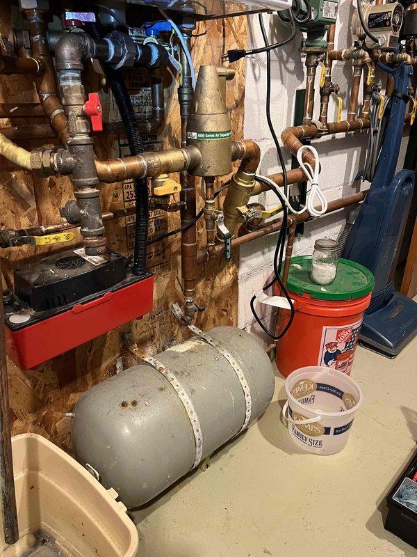 Performed annual prepaid maintenance on boiler system (1 of 2 boilers serviced). Addressed customer-reported low volume hot water issue at kitchen sink, discovering a plugged inlet screen. When attempting to service the component, the shutoff valve began leaking, requiring coordination with a plumber for specialized repair work.