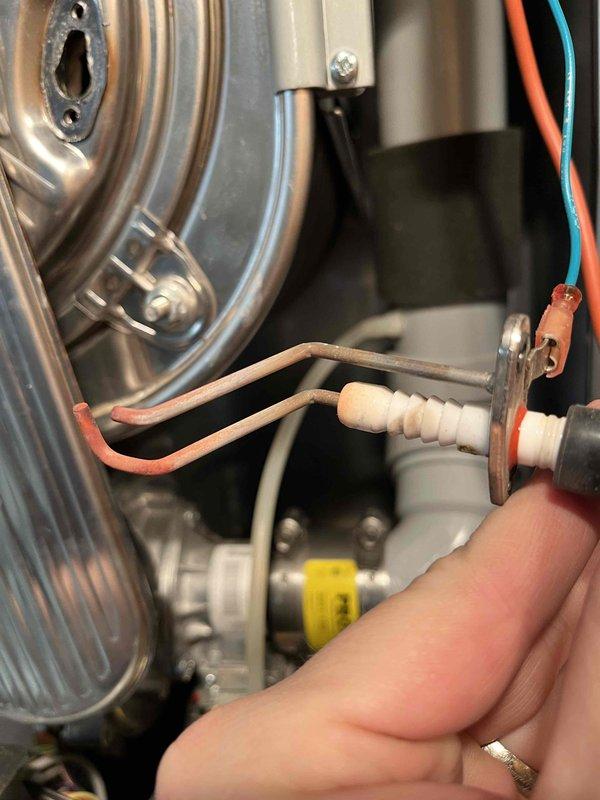 Performed annual prepaid maintenance on second boiler. Inspection revealed significant buildup in condensate trap and blocked drain line, which were cleaned and cleared. Additionally, completed thorough cleaning of flame sensor, igniter, and heat exchanger to restore optimal performance.