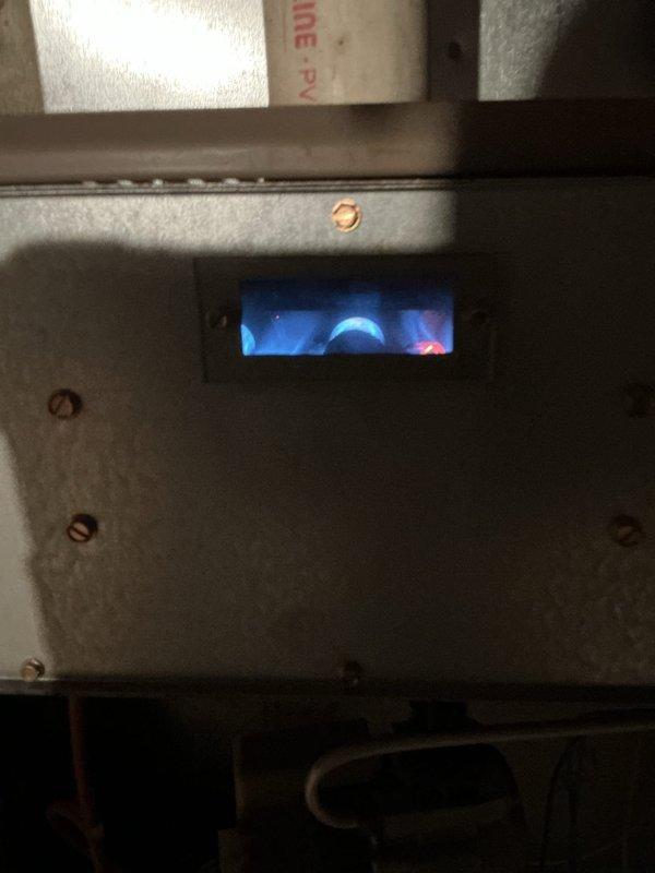 Successfully replaced inducer motor on furnace that exhibited extreme corrosion. Verified proper operation of replacement component and observed blue flame indicating normal combustion. Customer advised that due to extensive corrosion throughout system, replacement of entire furnace is recommended as future functionality cannot be guaranteed.