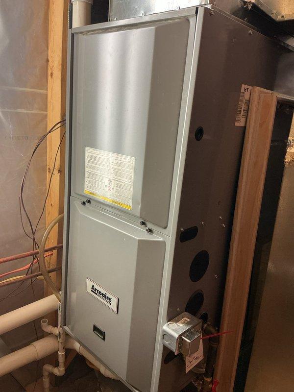 Responded to no heat complaint in upper detached garage. Diagnosed issue with thermostat configuration affecting the Arcoaire furnace system. Successfully reconfigured thermostat settings to restore proper heating functionality, returning the system to normal operation.