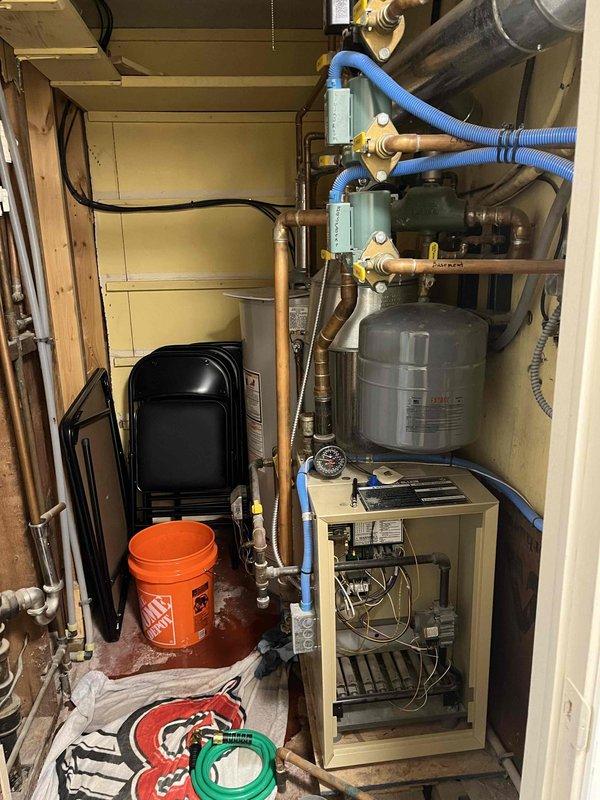 Responded to service call for pressure relief valve leak on aging boiler system. Diagnosed failed expansion tank as root cause of excessive pressure. Replaced expansion tank and pressure relief valve to restore proper system operation and prevent further leakage. System tested and confirmed operating within normal pressure parameters.